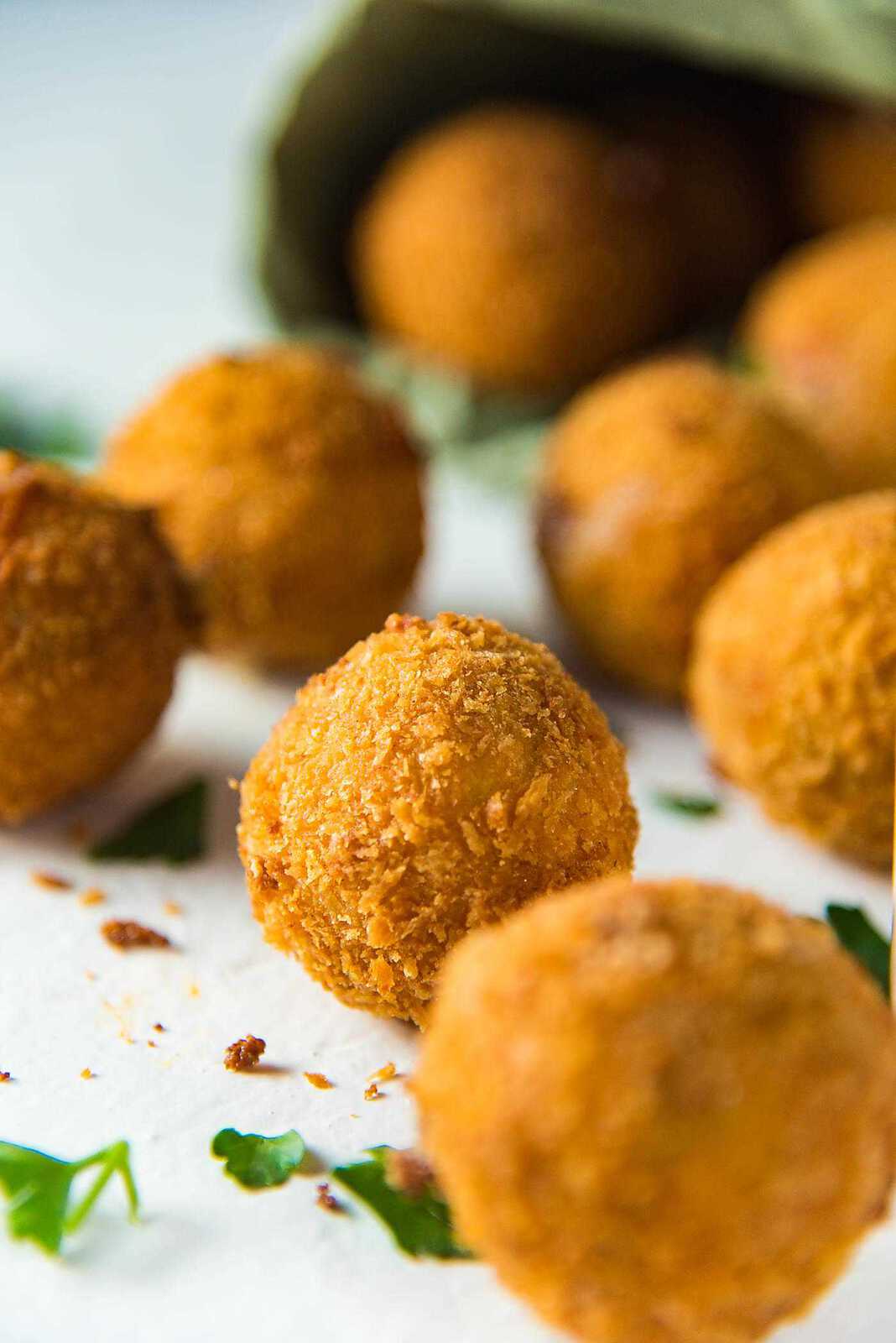 Crispy Cheese Jalapeno Bacon Bites - The crispy cheese balls are coated in a crunchy panko crumb coating, and is the perfect texture for the gooey melted cheese center.