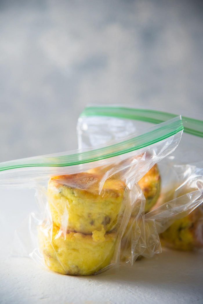 Make ahead freezer friendly egg muffins - Pack the frozen egg muffins into bags and store in the freezer until you need them. 