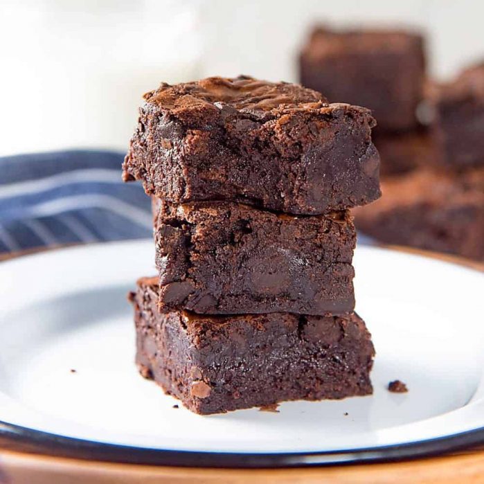 The Best Fudgy Chocolate Brownies - These fudgy brownies are made with cocoa powder with chunks of real chocolate in the brownies. With detailed tips on how to make perfect fudgy cocoa brownies. 