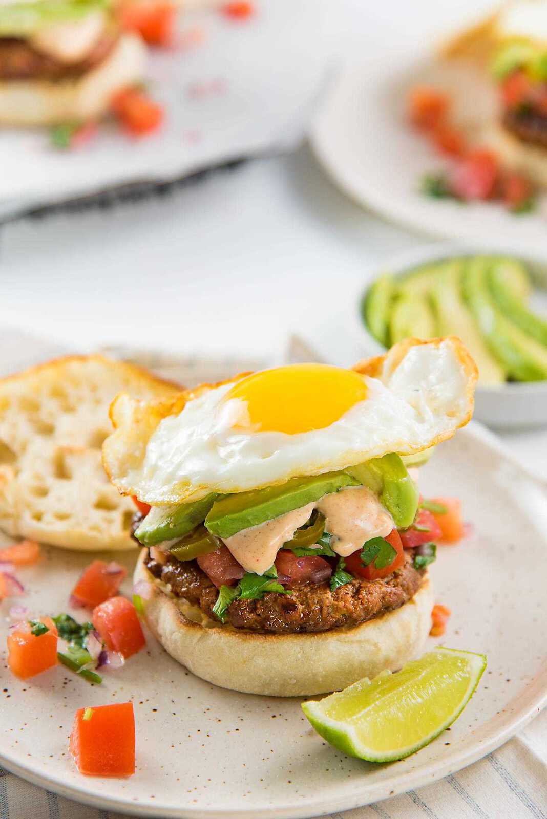 Breakfast Chorizo Burgers - Perfect hearty breakfast, or brunch with spicy chorizo burgers, pico de gallo and a fried egg!