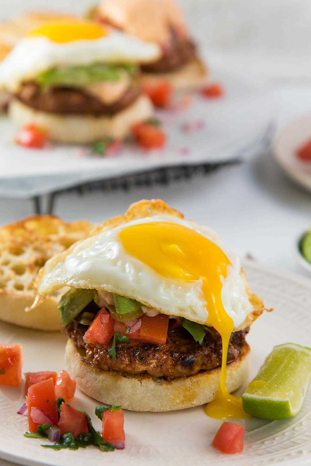 Breakfast Chorizo Burgers - Perfect hearty breakfast, or brunch with spicy chorizo burgers, pico de gallo and a fried egg!