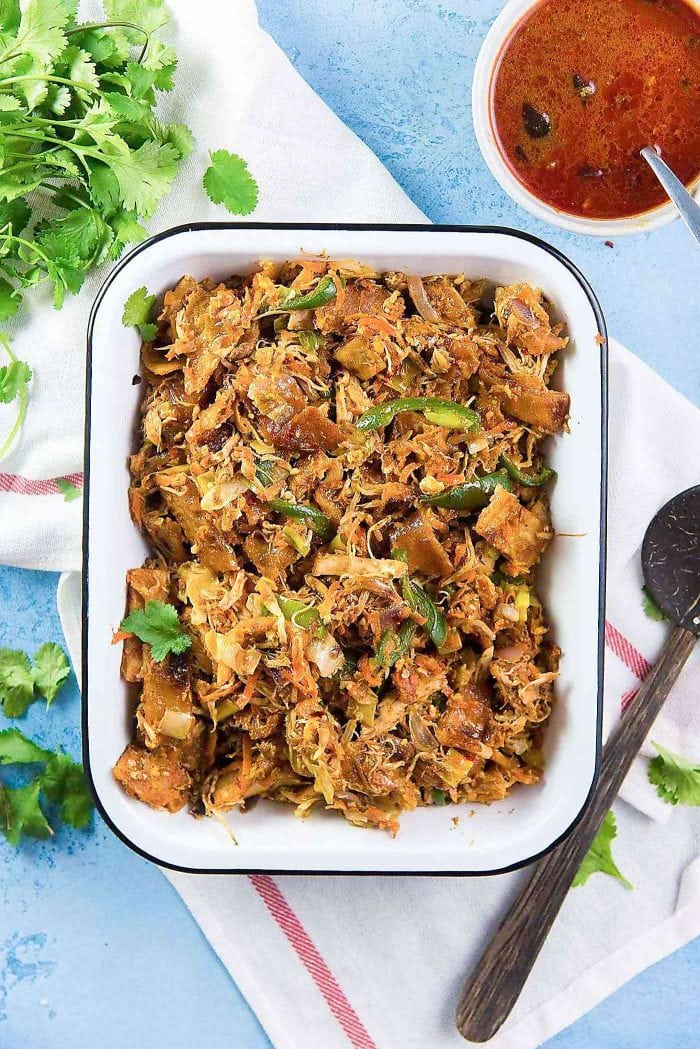 Sri Lankan Chicken Kottu Roti - Stirfried chopped flatbread Sri Lankan style. Koththu roti is a popular Sri Lankan food that you can now enjoy at home. Great way to use up leftover chicken or vegetables too. 