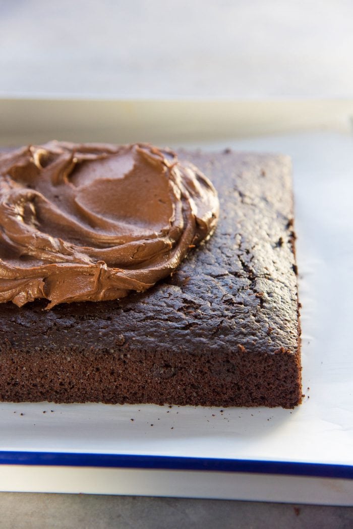 One Bowl Fudgy Chocolate Cake - Trim the edges and top the cooled cake with Chocolate Buttercream Frosting.