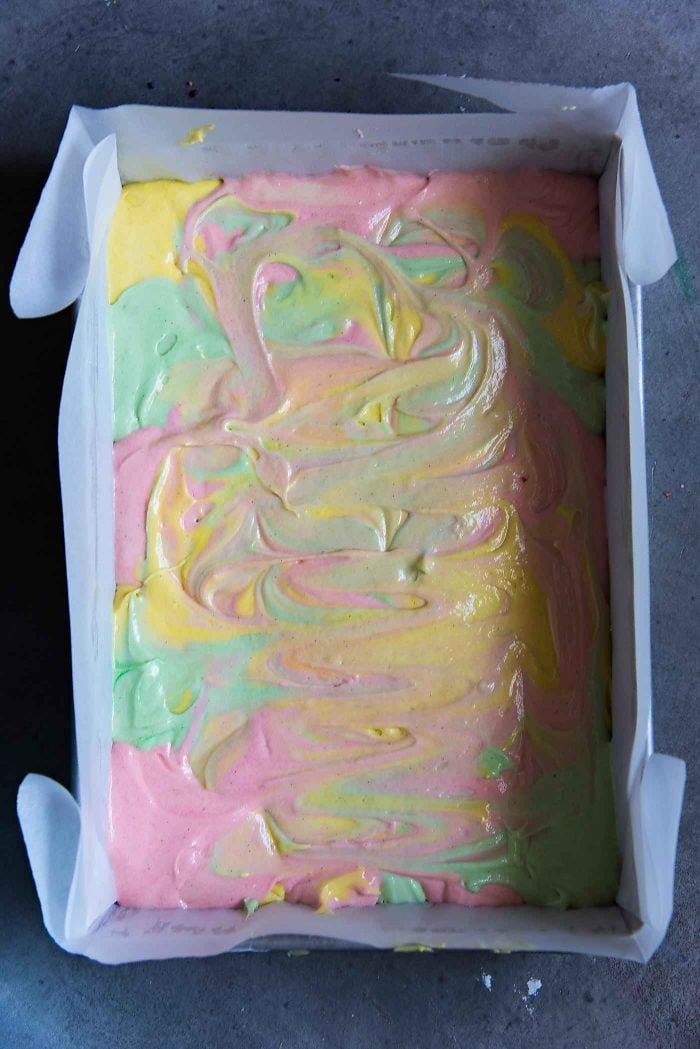 Ribbon Cake (Swirled Pastel Sheet Cake) - Swirl the pastel colored vanilla batter and smooth the top before baking.