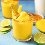 Frozen Mango Margarita - a creamy, sorbet like, fruity and refreshing frozen margarita with a spicy lime chili salt ring to kick it up another notch!