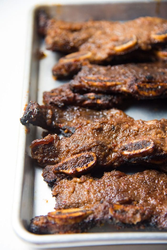 LA Galbi (Korean BBQ Short Ribs) - Korean BBQ beef just after they have been grilled. The sugar in the marinade makes the grilled meat shiny. 