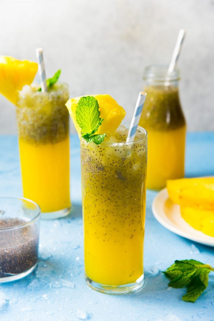 Vanilla Pineapple Chia Fresca - a fruity, refreshing, and surprisingly filling drink with the added nutritional value of chia seeds! You can use basil seeds instead if you want. Topped with crush ice and mint sprigs. 
