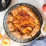 Easy Peach Galette - A delicious buttery pie crust, with a fresh, juicy peach filling! Fool proof, simple and easy summer dessert.Â