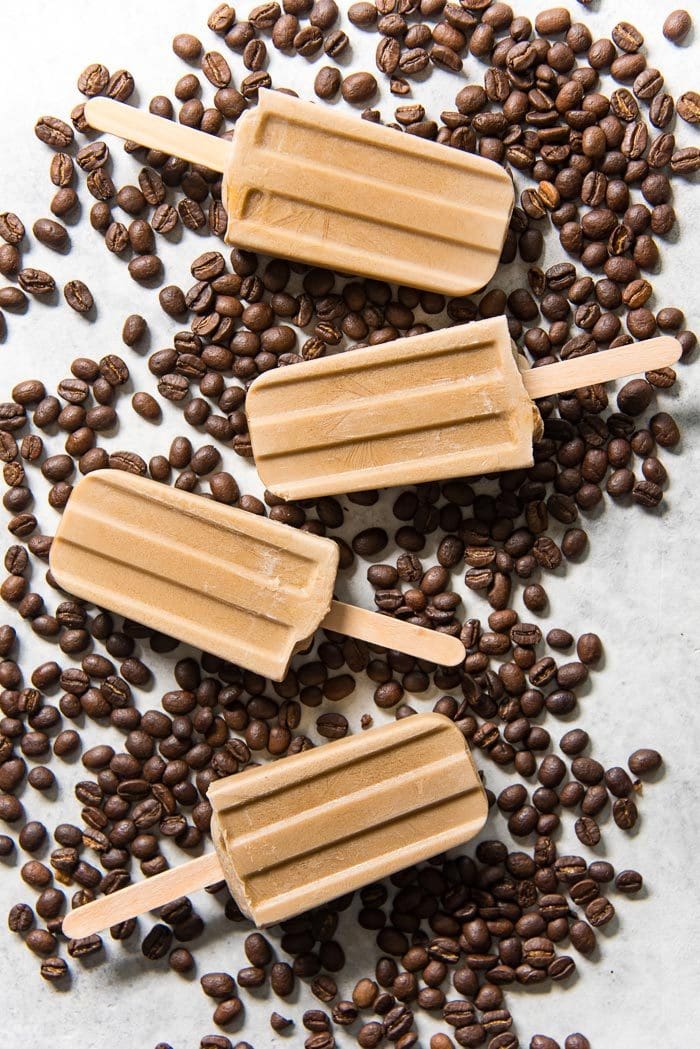 Iced Coffee Popsicles - A creamy coconut milk breakfast popsicle that is made with just 4 ingredients and is gluten free, dairy free, paleo, and vegan-friendly as well! 