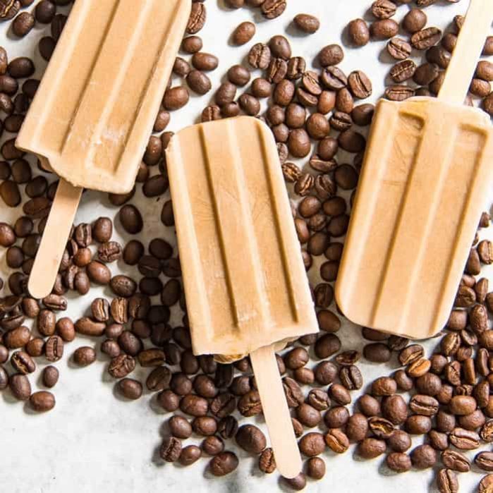 Iced Coffee Popsicles - A creamy coconut milk breakfast popsicle that is made with just 4 ingredients and is gluten free, dairy free, paleo, and vegan-friendly as well! 