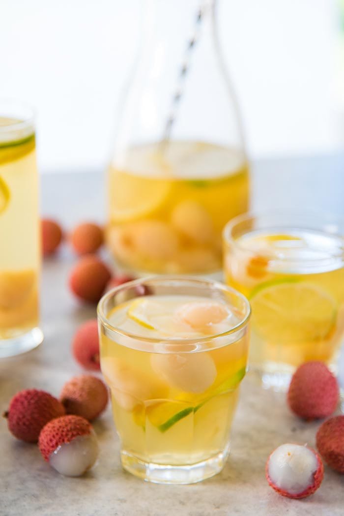 How to serve Ginger lychee sangria blanca - Make sure to have slices of the lemon and lime along with lychee as well.