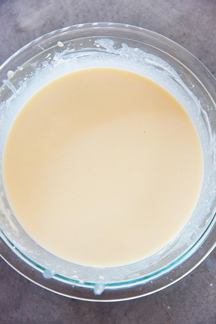 All the liquid has been mixed in, to make a smooth crepe batter. This can be made with a blender too. 