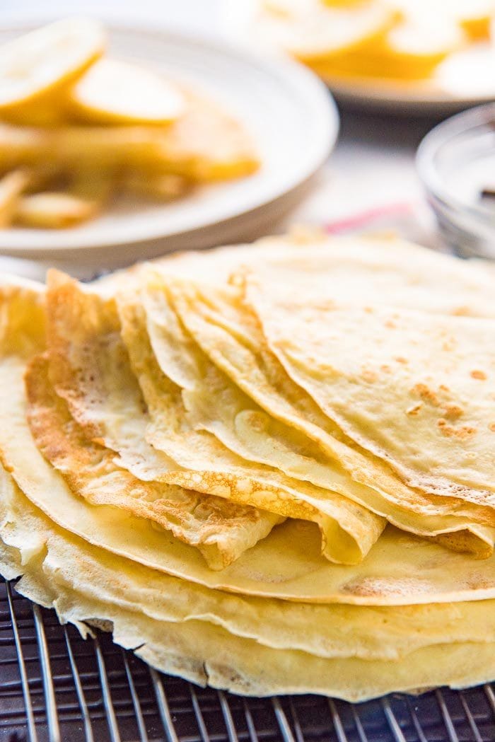 Soft classic crepes folded over ontop of a stack. 