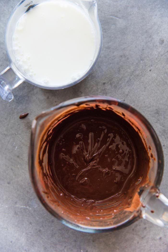 The cocoa powder dissolved in hot water, and being mixed with buttermilk. 