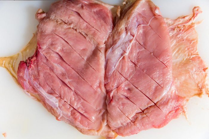 Make shallow cuts on the meat so that the seasoning will penetrate the meat better.