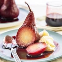 Red Wine Poached Pears - a simple and easy recipe that is absolutely elegant! Get tips to perfect this sweet and spiced simple pear dessert.