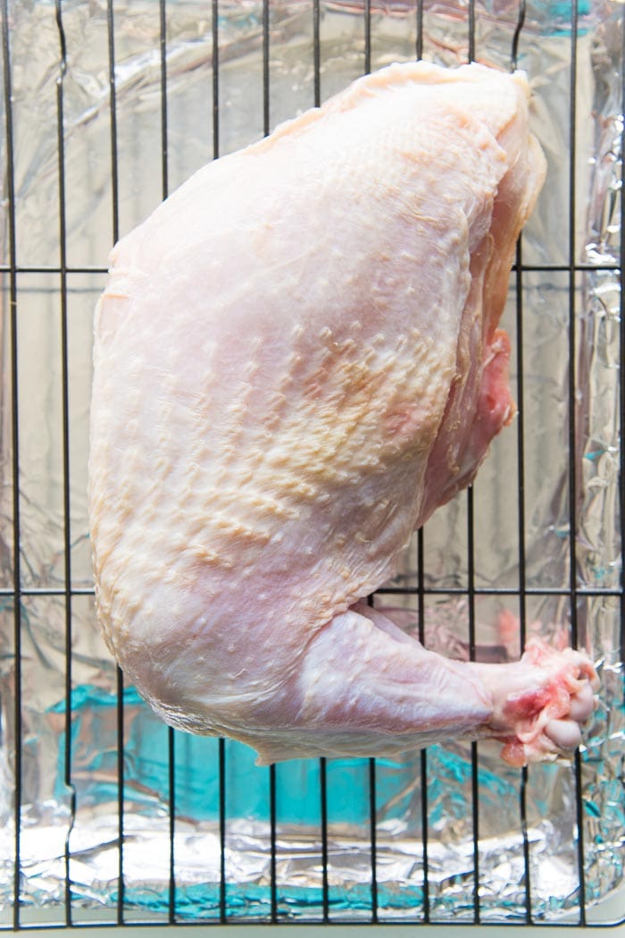 Salted turkey breast, after marinading for 24 hours. Ready to be coated with the spice mix.