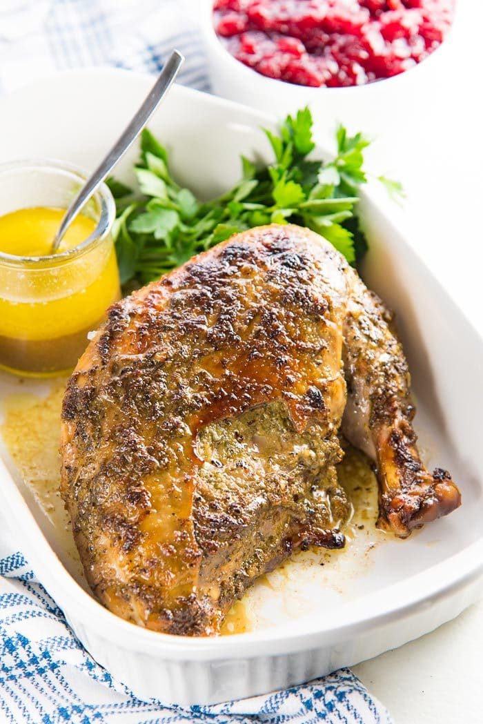 Slow Cooker Turkey Breast - A sage garlic butter flavored turkey breast roast, cooked to juicy perfection in the slow cooker! Perfect for Thanksgiving, holiday dinners or anytime you like to make a juicy roast. 