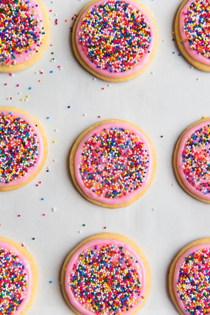 An overhead view of funfetti cookies made with sugar cookies and rainbow nonpareils.
