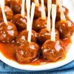 Cocktail Meatballs - juicy, flavorful meatballs coated in a honey sriracha sweet and spicy sauce. Perfect appetizer for parties or as game day snacks. 