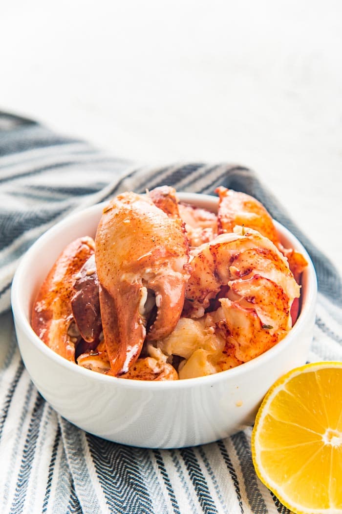 Perfectly cooked Lobster meat in a white bowl