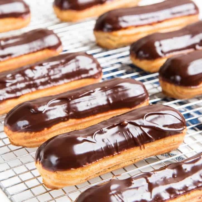 Classic Chocolate Eclairs - A foolproof recipe for making perfect eclairs that are crisp and puffy and filled with chocolate or vanilla pastry cream. 