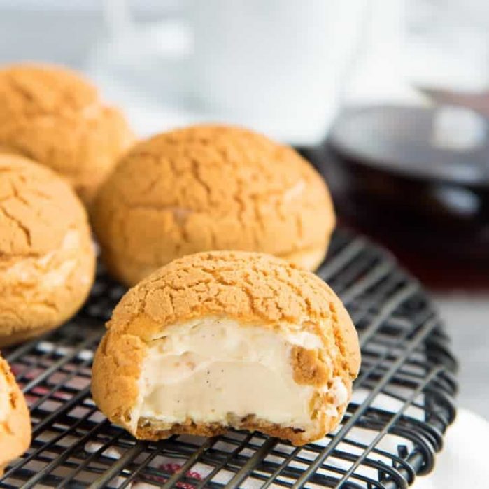 Choux au Craquelin with Salted Caramel Cream - A crispy choux pastry with a cookie crust, filled with a airy, and creamy salted caramel diplomat cream.