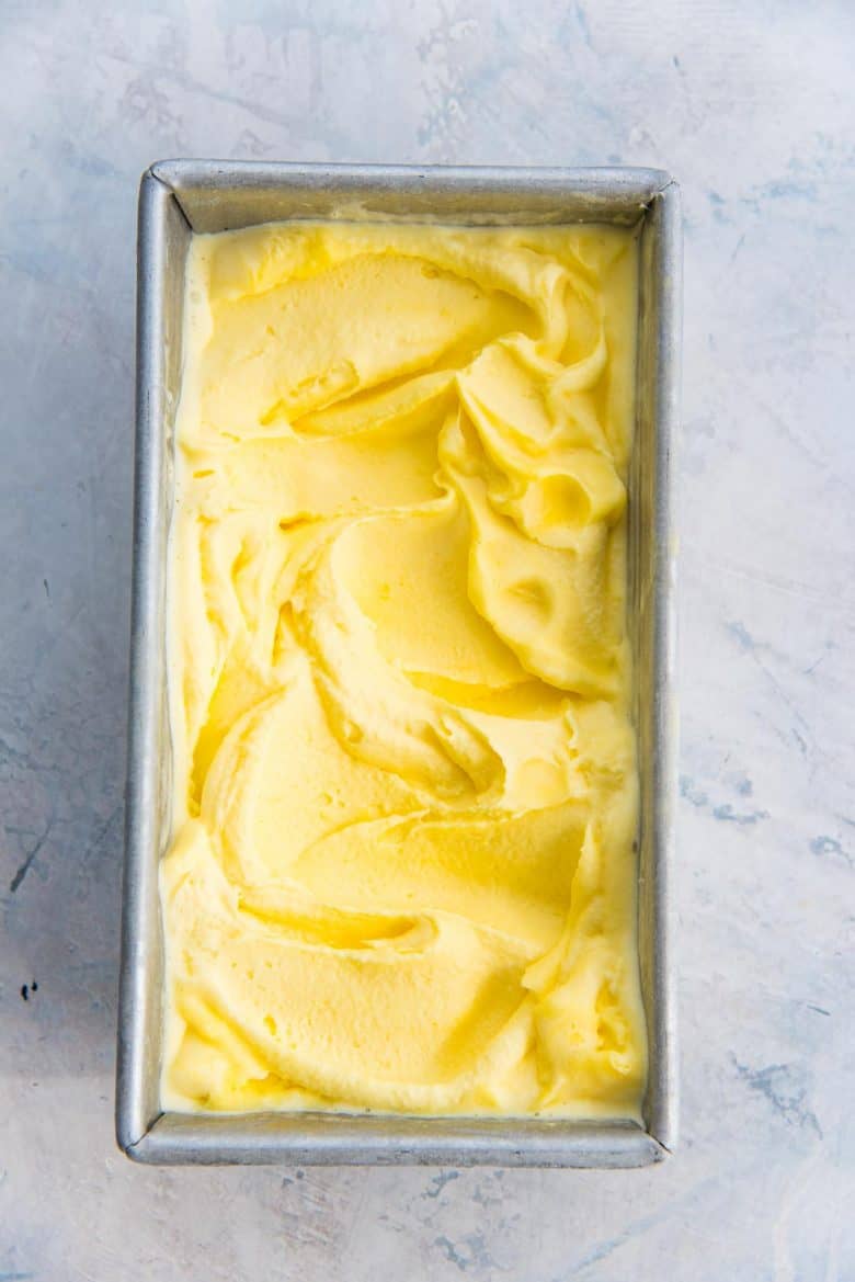 Lemon Ice cream in a container after freezing overnight