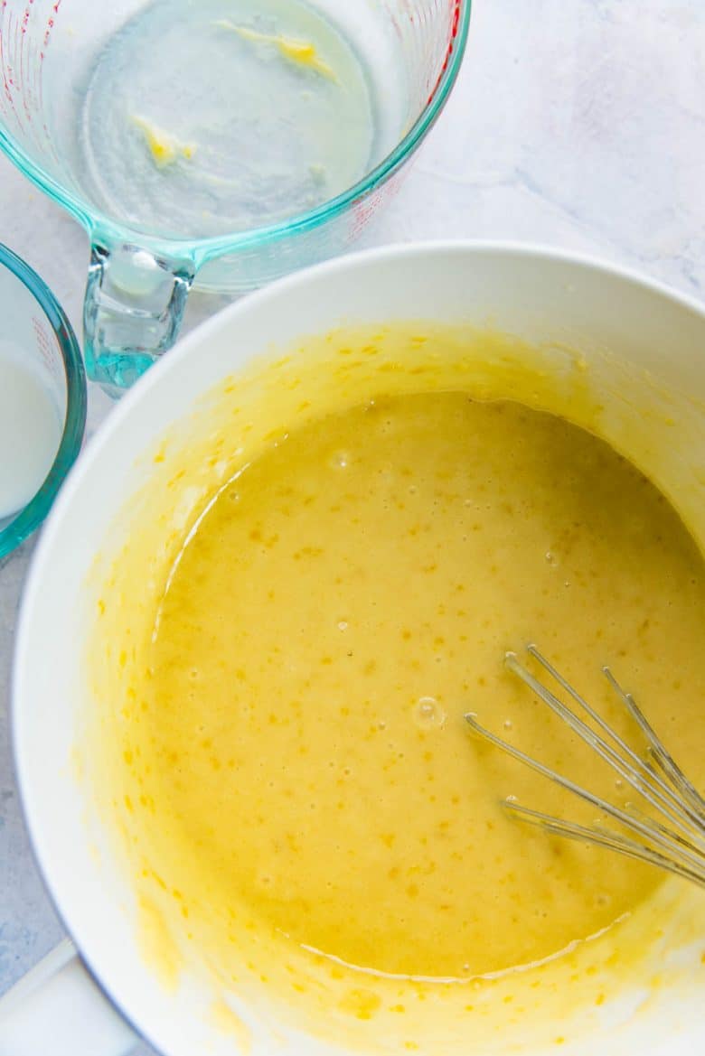 Lemon cake batter whisked and smooth in a bowl