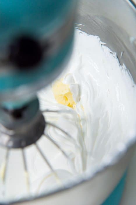 Adding butter to the meringue basde
