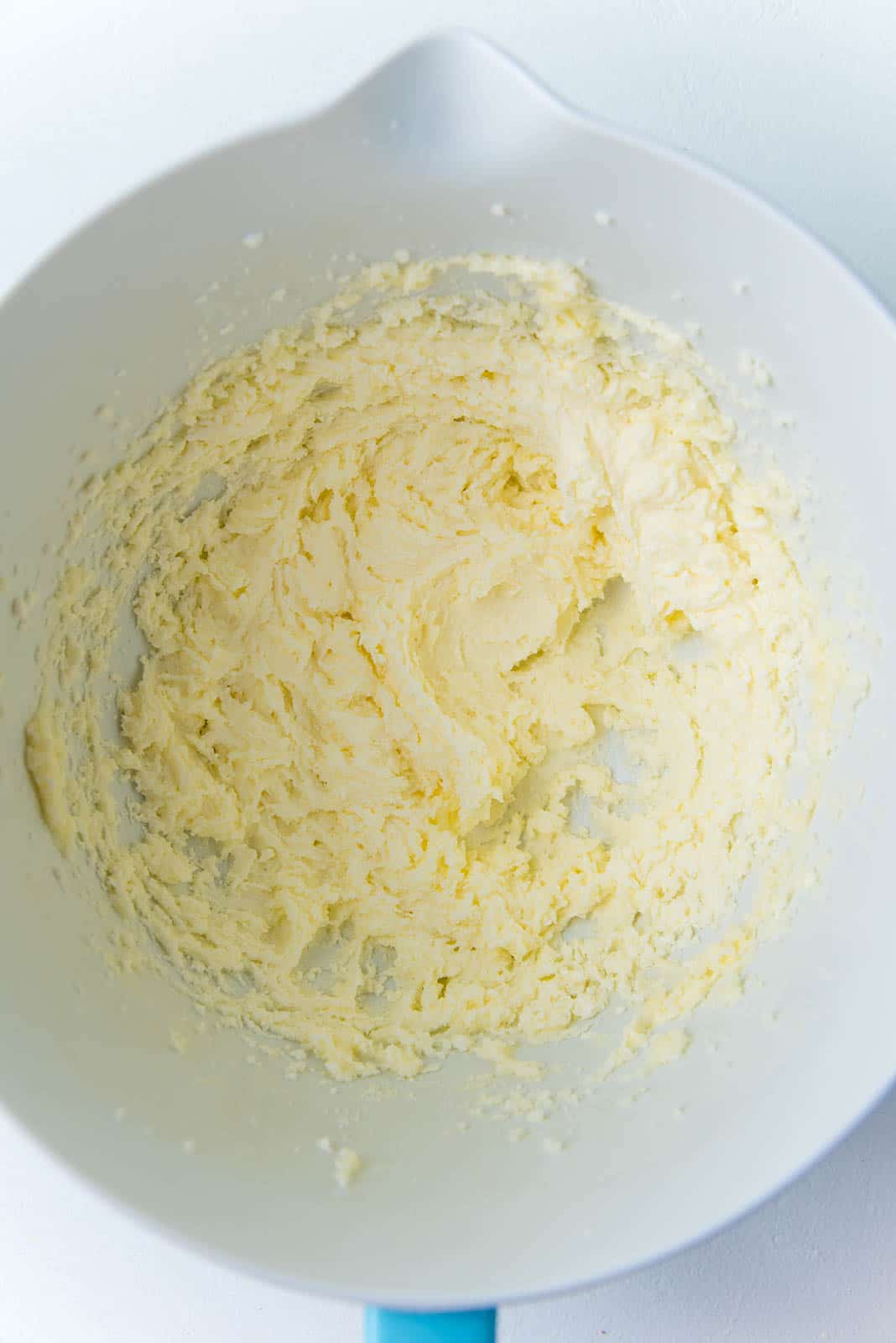 Creamed butter and sugar in a mixer bowl.