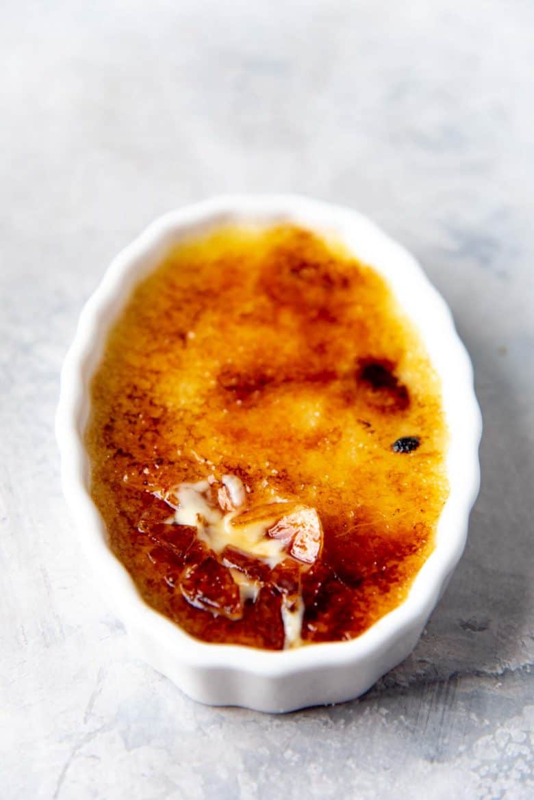 Creme brulee dish with the caramel layer cracked