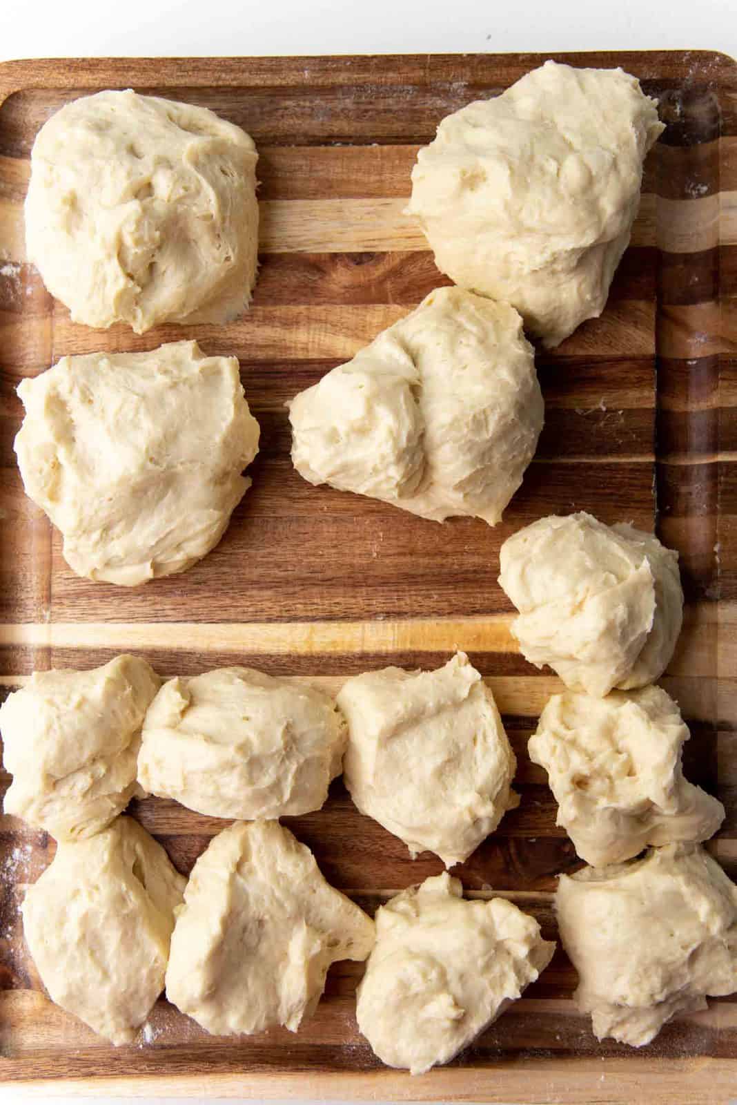Japanese milk bread dough divided into 4 portions, and 9 portions