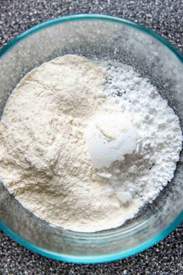 Flour and confectioners sugar in a bowl to make the flour paste for the crosses
