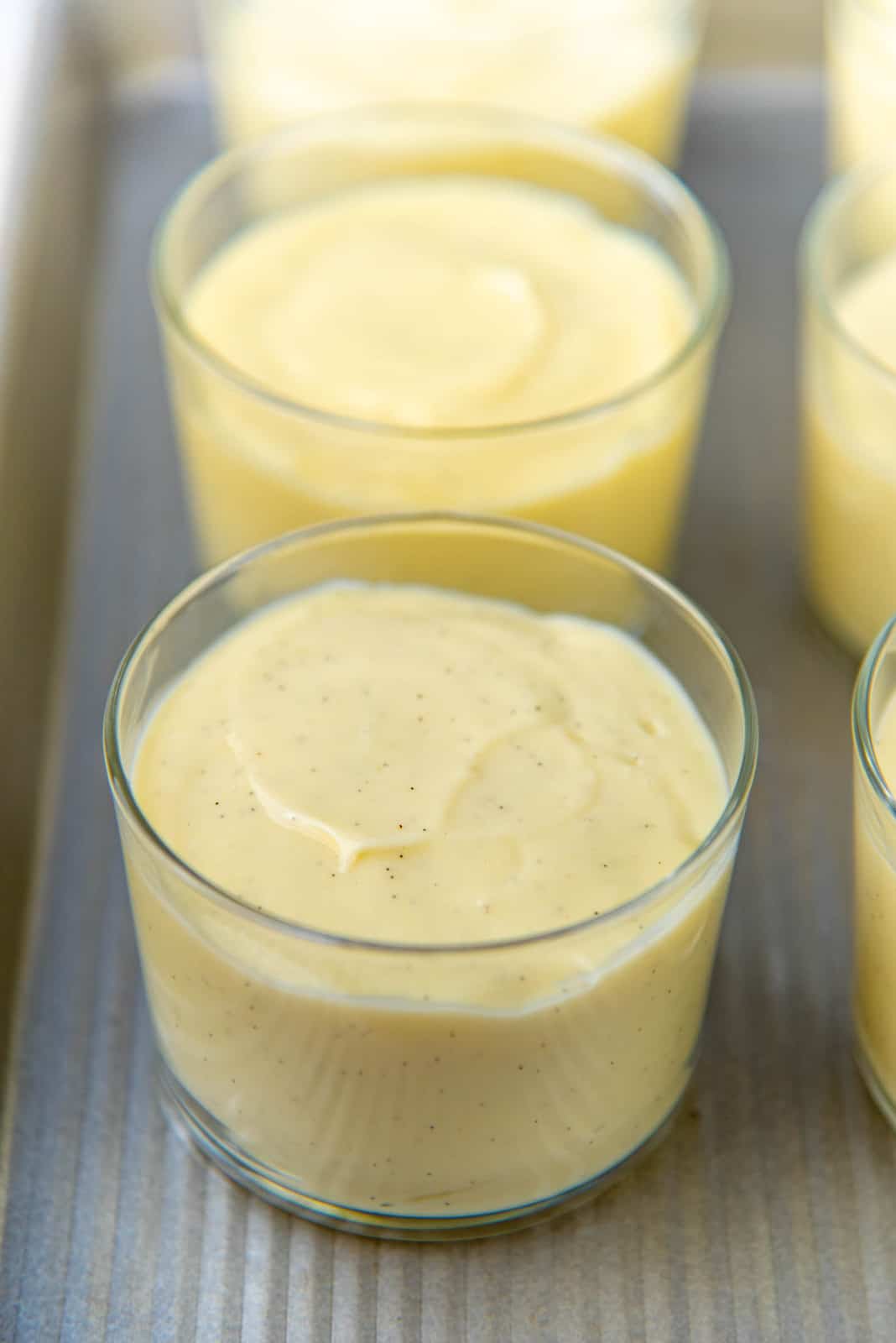 Individual servings of vanilla pudding