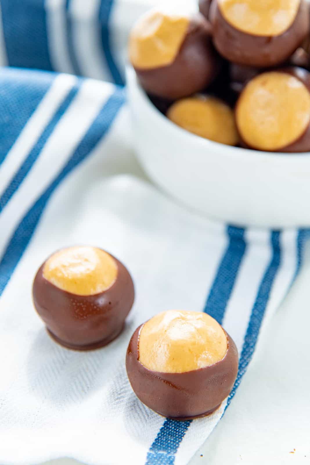 Buckeyes on a cloth napkin, with a close view