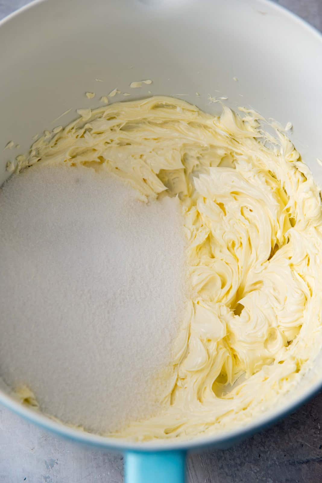 Adding sugar to the creamed butter