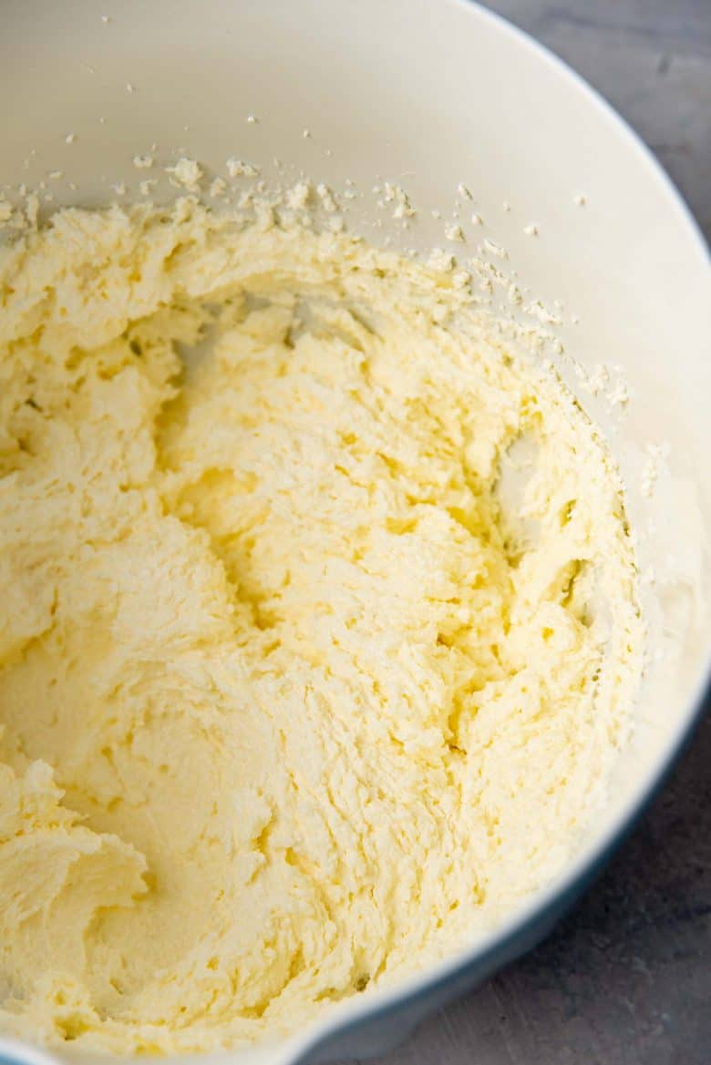 An image showing the texture of the creamed butter and sugar at the start of the process of making butter cake