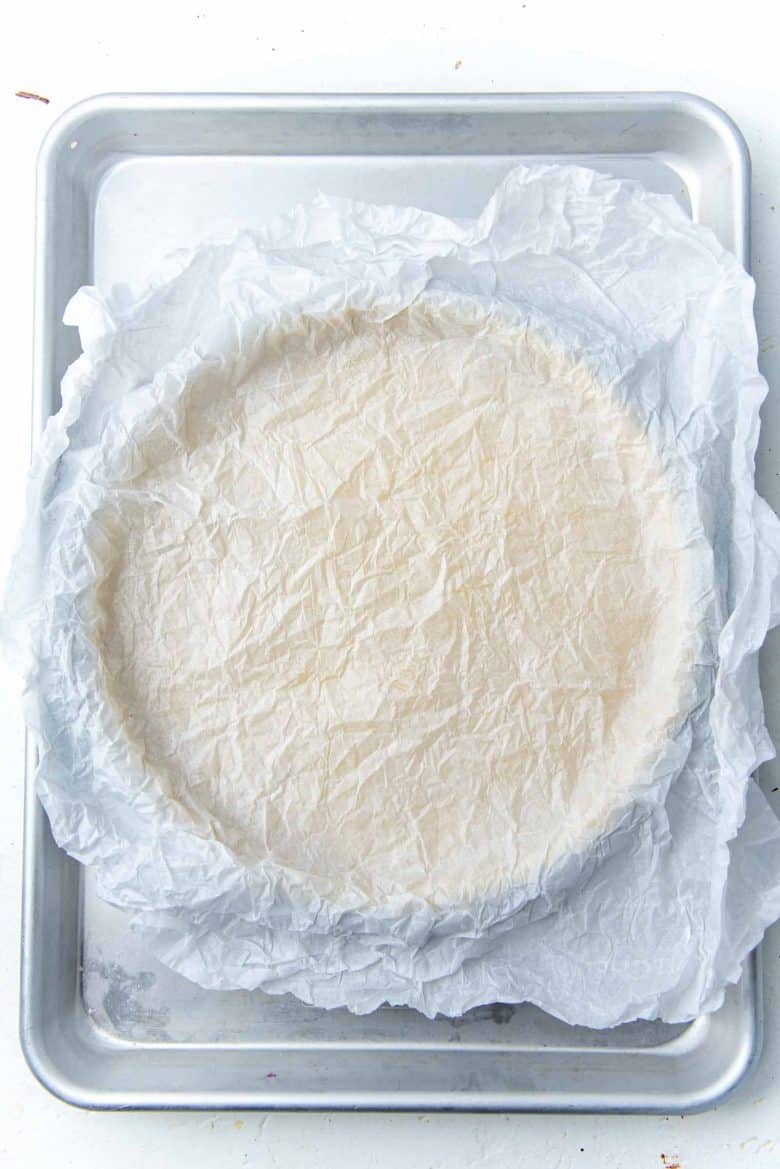 Lining the dough with parchment paper
