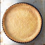 Sweet shortcrust pastry in a pan.