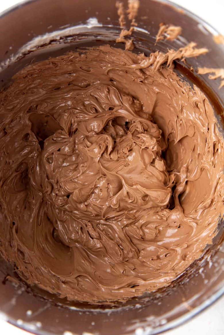 After adding the melted chocolate to the easy chocolate swiss meringue buttercrea