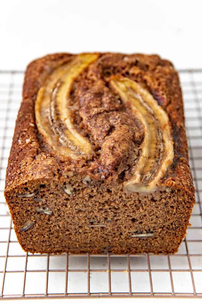 Whole wheat banana bread on a cooling rack