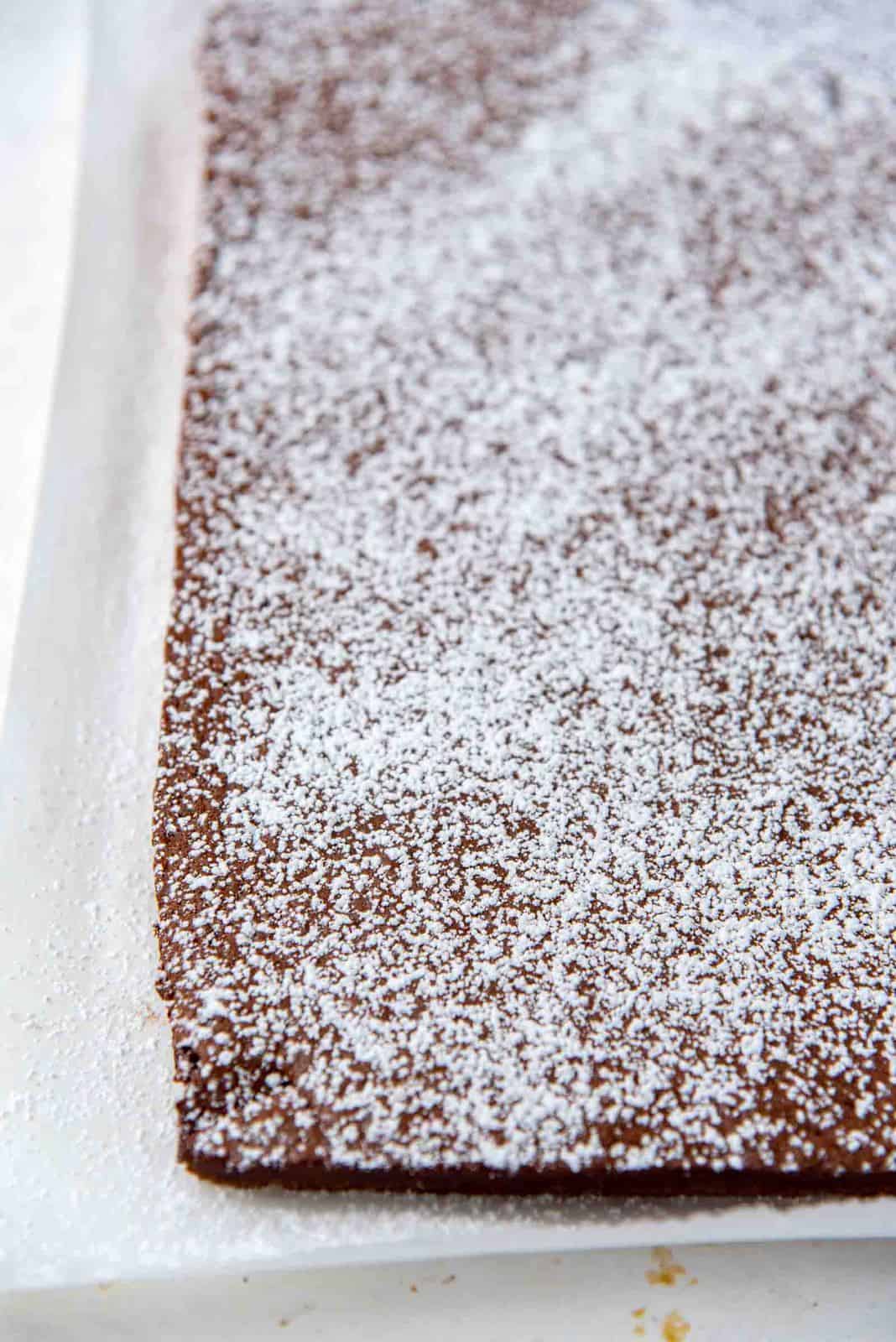 Cake sheet dusted with confectioners sugar