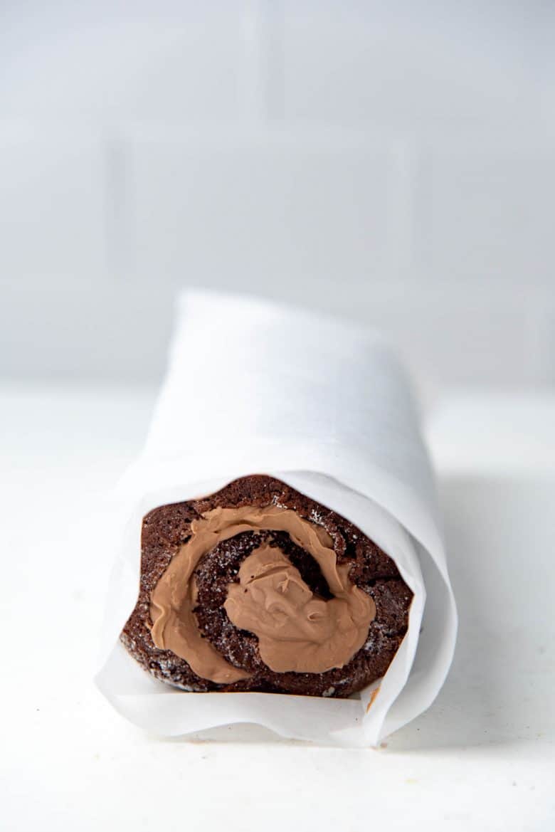 Chocolate swiss roll filled and rolled