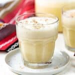 Homemade eggnog made with no raw eggs in a glass.