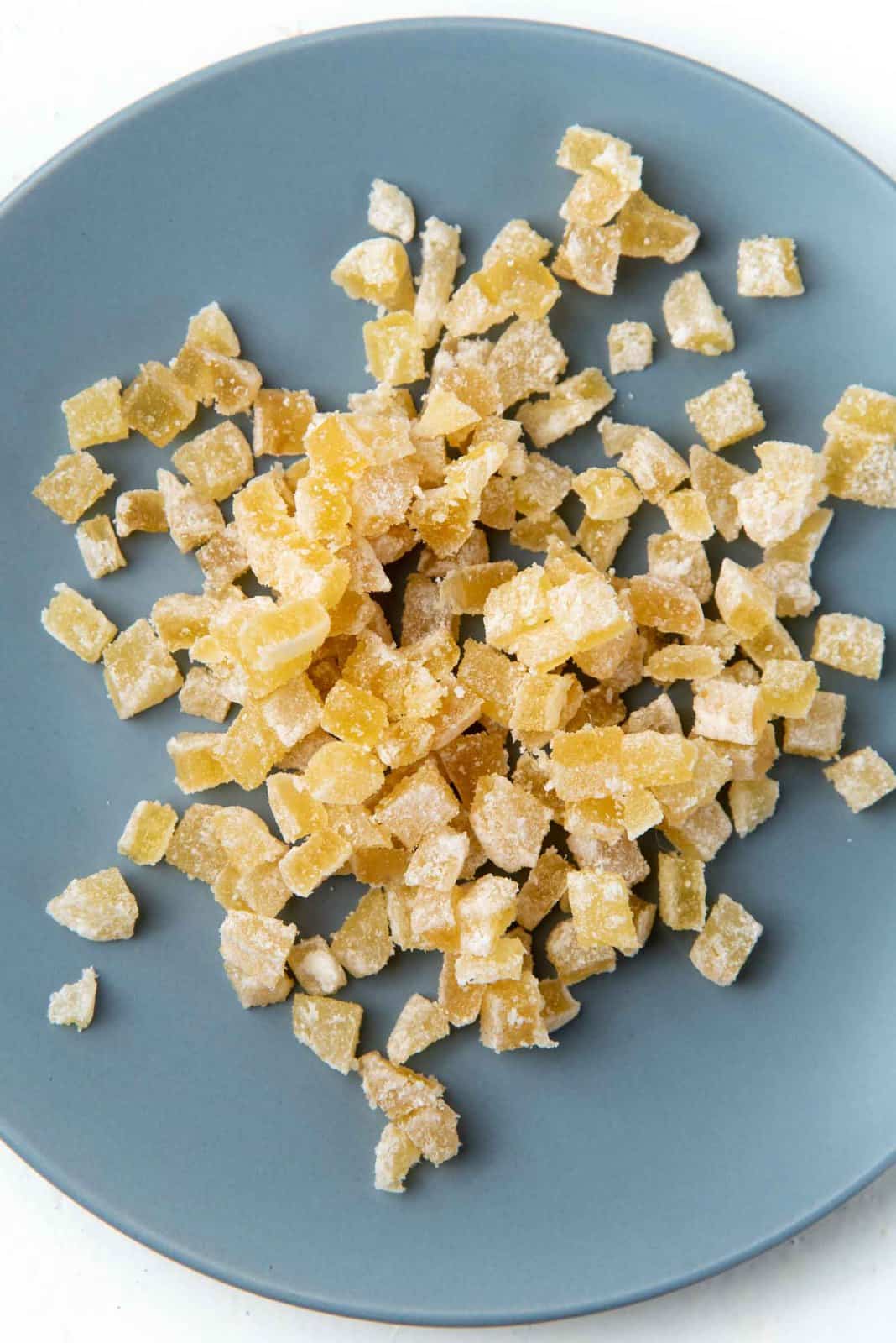 Crystallized ginger on a blue plate