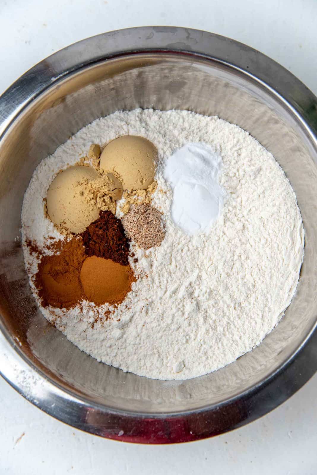 Dry ingredients along with spices needed in a bowl