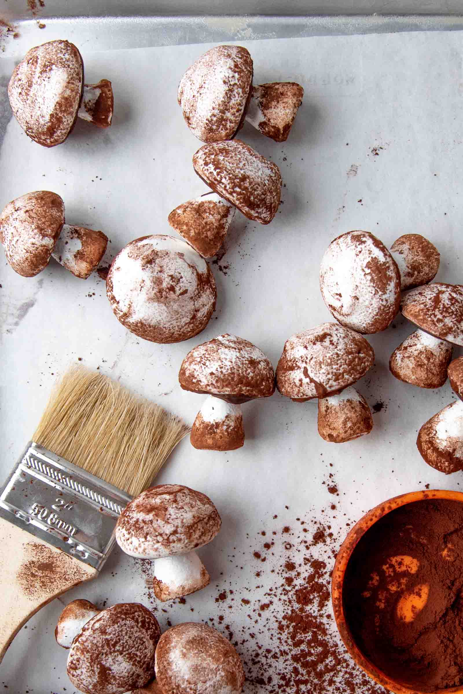 Meringue mushrooms with cocoa dusted