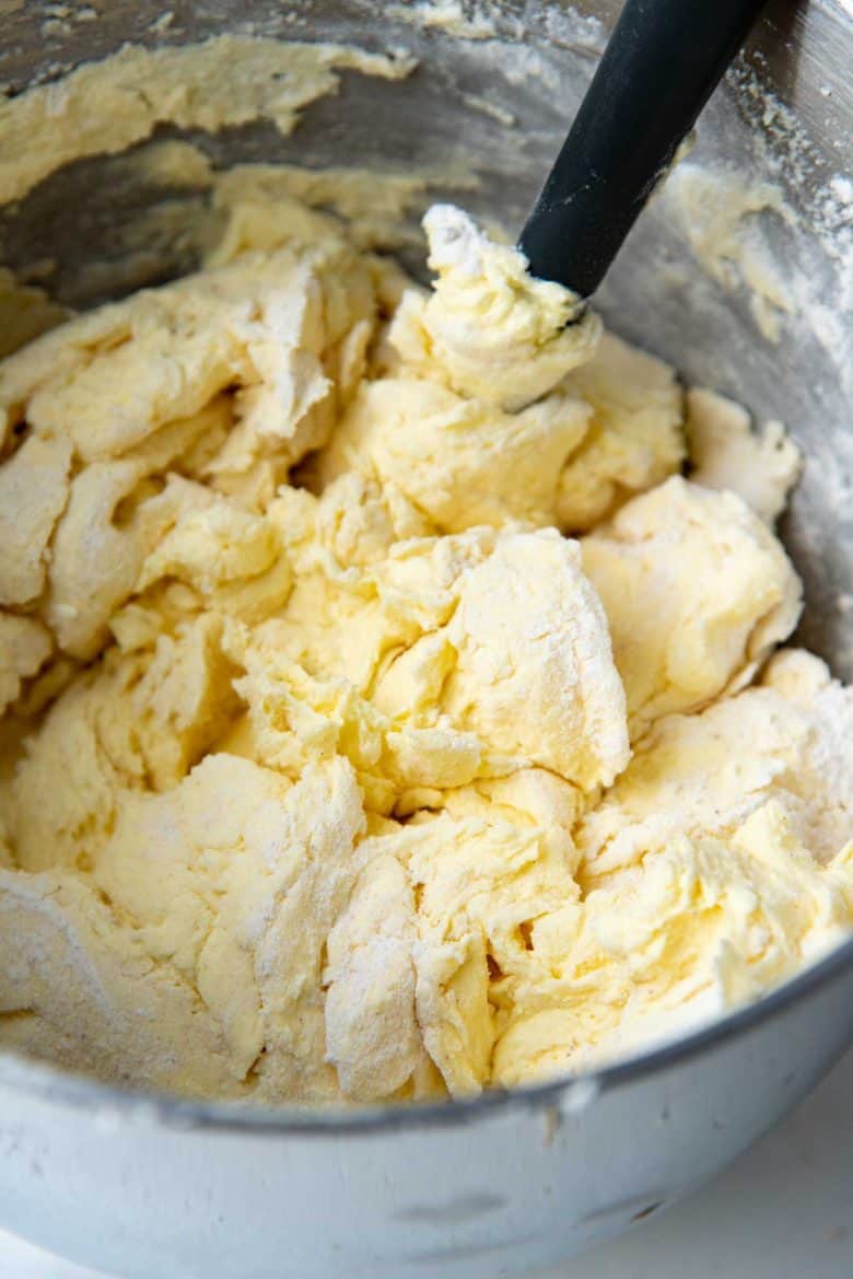 Folding in dry ingredients into the cake batter