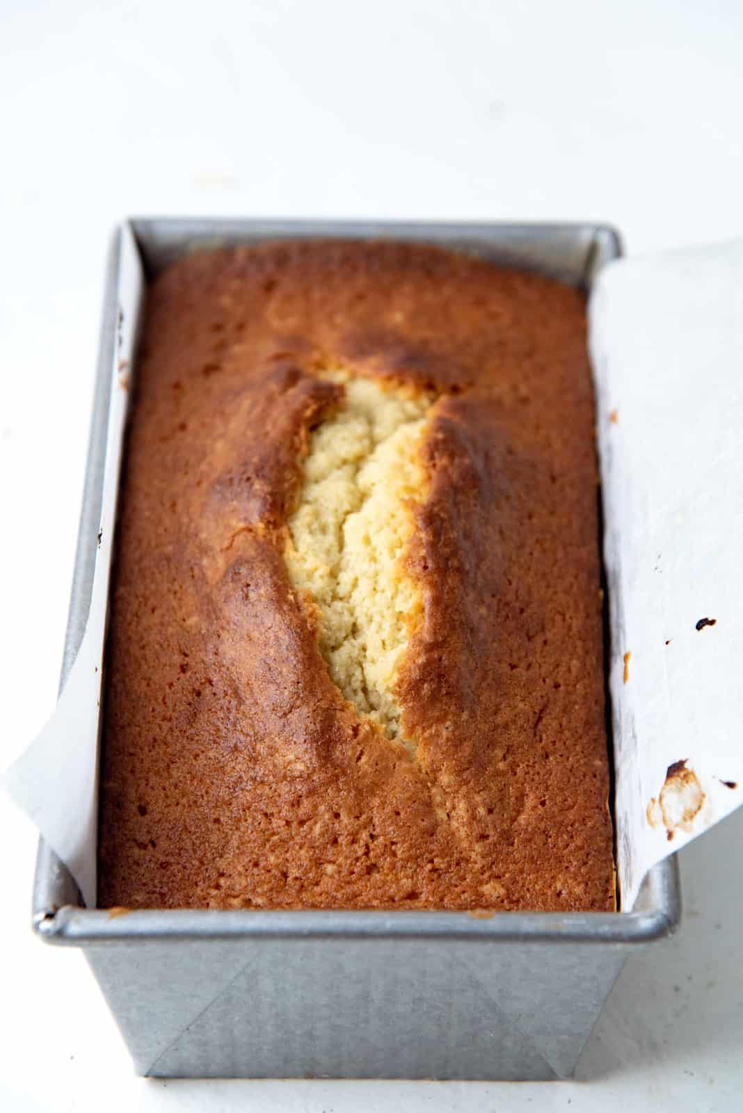 Freshly baked eggnog pound cake still in the pan
